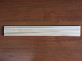 Unfinished wooden rod